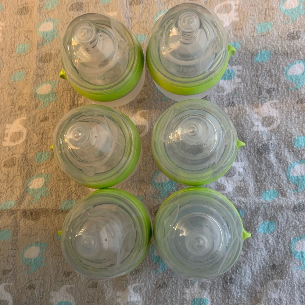 6 como tomo 5oz bottles. One was used rest are new. All in excellent condition.